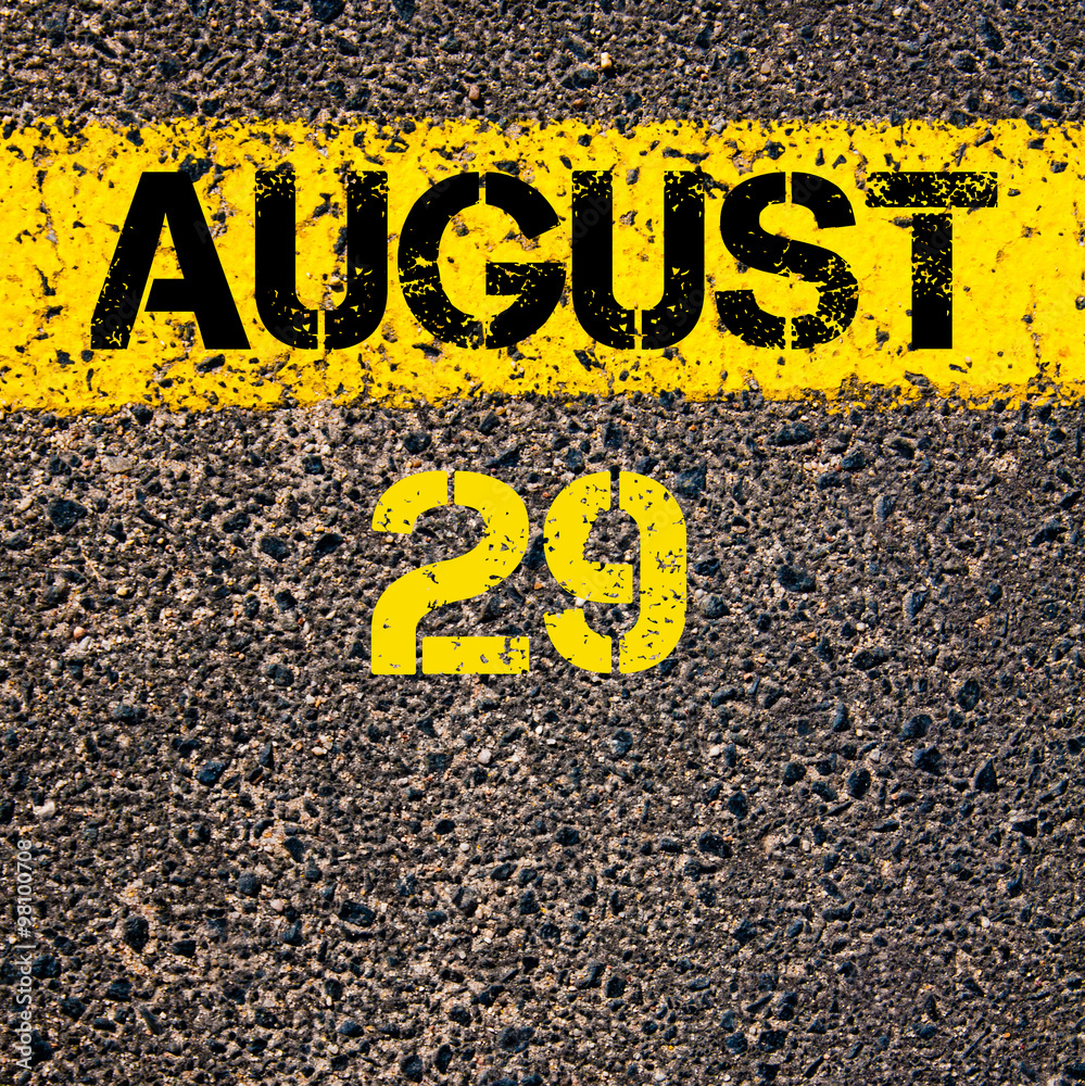 29 August calendar day over road marking yellow paint line