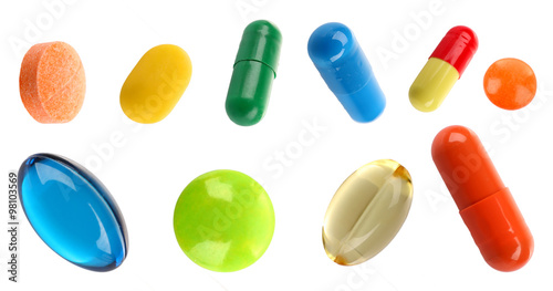 Different pills shaped as frame isolated on white