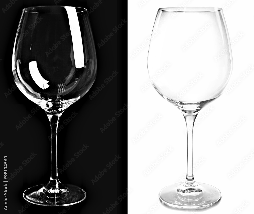 Two empty wine glasses, isolated on black and white backgrounds Two empty wine glasses, isolated on black and white backgrounds