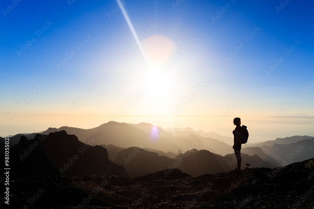 Woman hiking success silhouette in mountains sunset - obrazy, fototapety, plakaty 