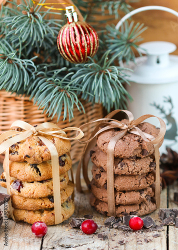 Chocolate cookies and biscuits with cranberries. Christmas gifts