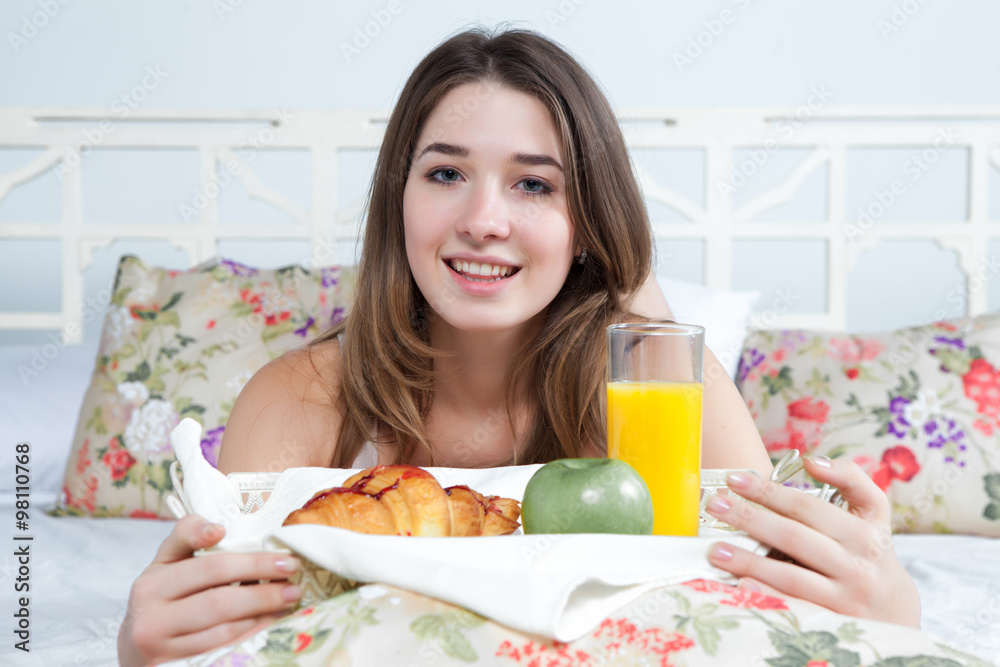 The morning and breakfast of young beautiful girl