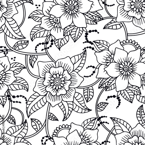 Floral seamless pattern with hand drawn doodle flowers.