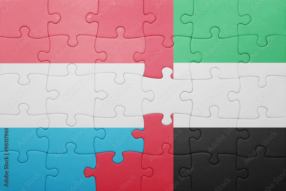 puzzle with the national flag of united arab emirates and luxembourg puzzle with the national flag of united arab emirates and luxembourg