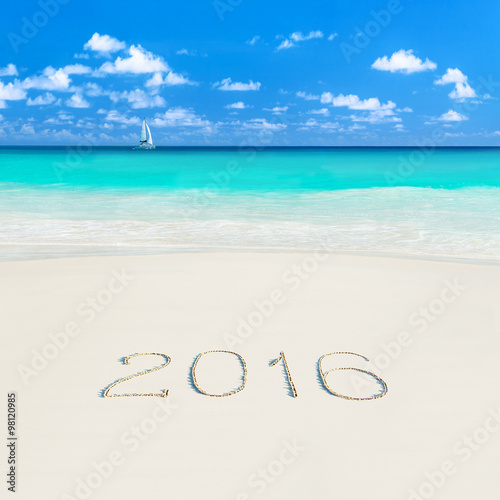 Yacht at tropical sandy beach. Season 2016 vacation and travel c