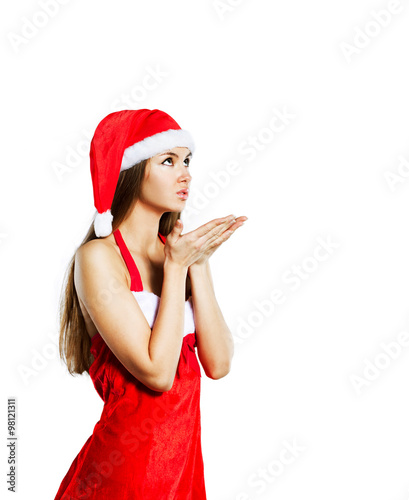 Beautiful sexy girl in a Christmas suit  isolated on a white background.