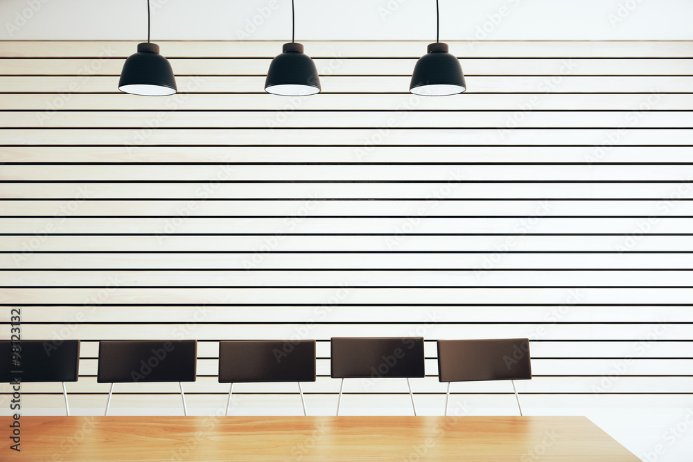 Obraz premium Modern conference room with lamps and furniture