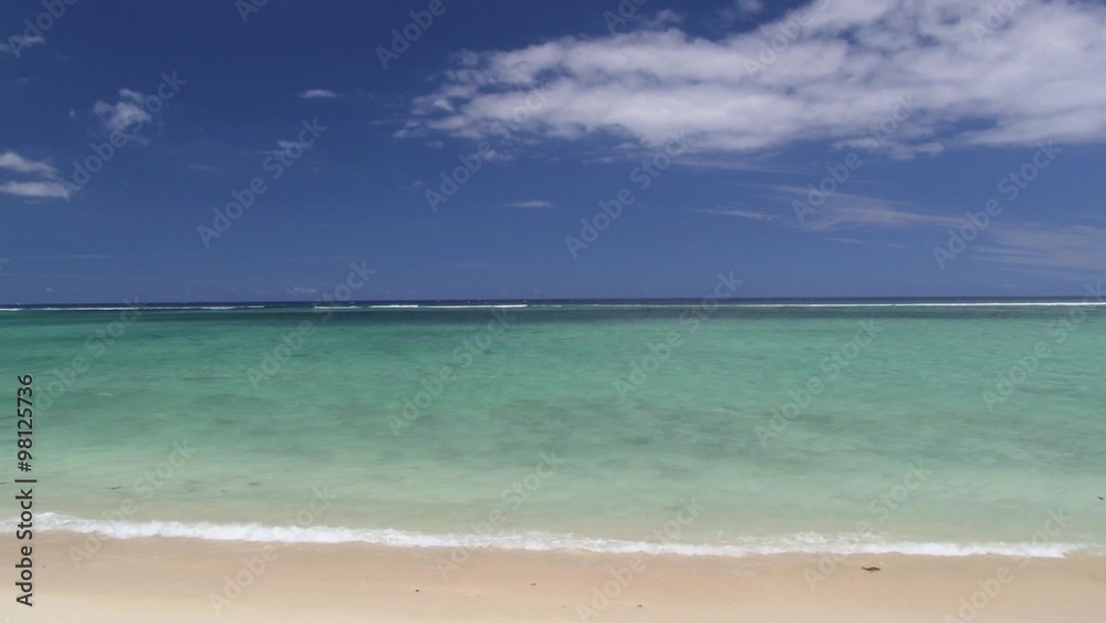 View to the Indian ocean and beautiful sandy beach at Mauritius island. View to the Indian ocean and beautiful sandy beach at Mauritius island.