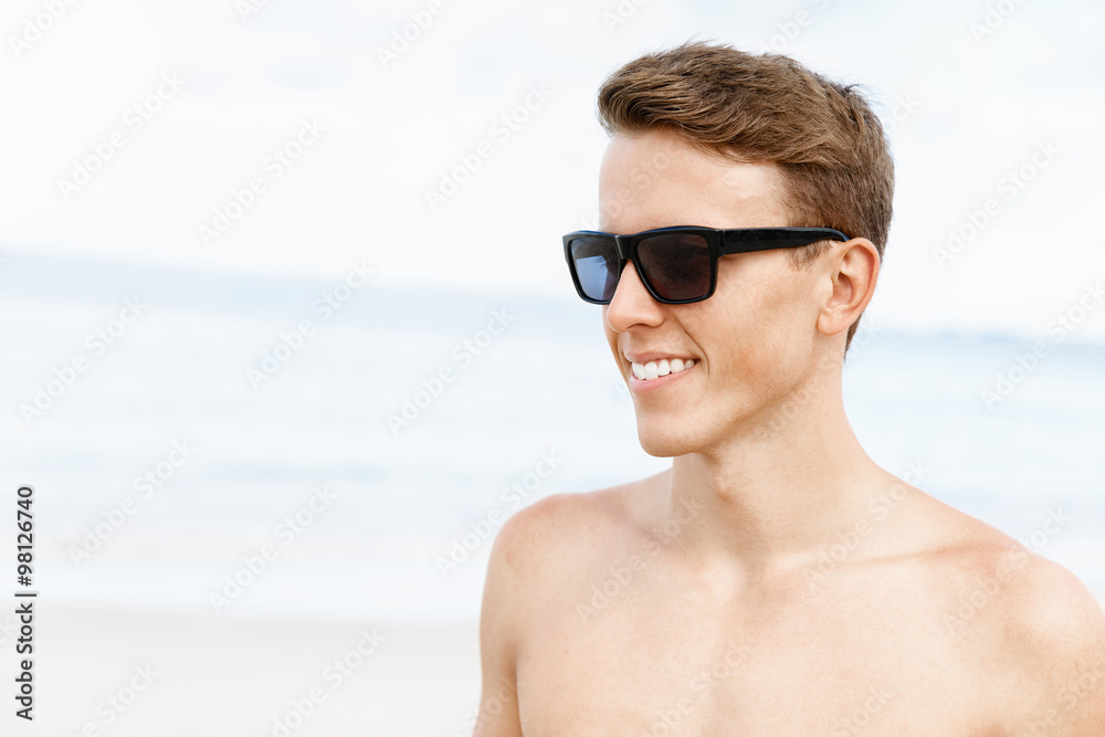 Handsome man posing at beach Handsome man posing at beach