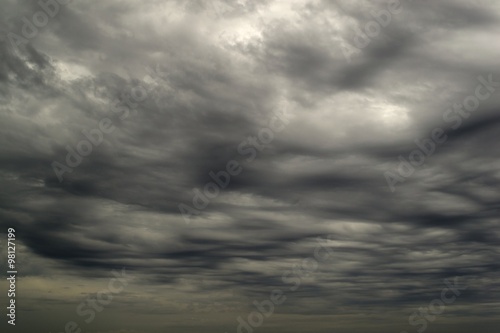 Dark gloomy stormy sky with clouds photo