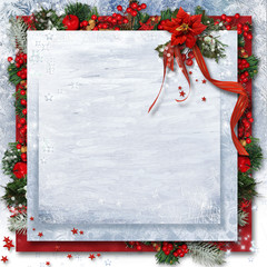 Christmas background with poinsettia, holly and branches.Greetin