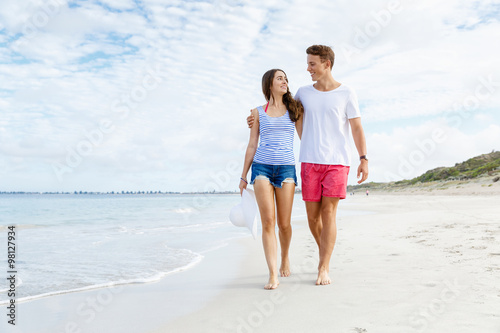 Romantic young couple on the beach © Sergey Nivens