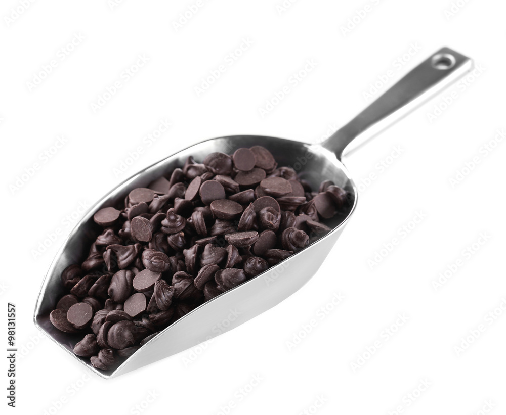 Fototapeta premium Chocolate morsels in scoop isolated on white