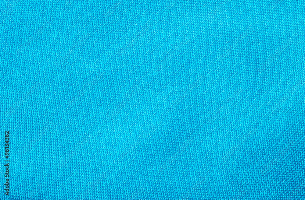 Fototapeta premium Closeup blue fabric at the necktie texture background