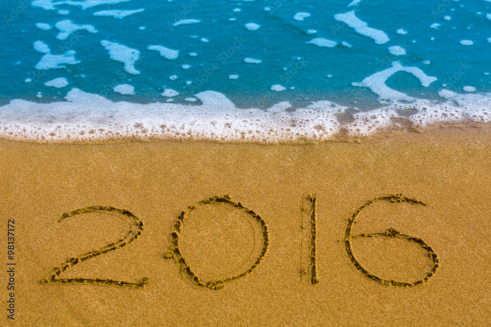 Happy New Year 2016 on the sea beach
