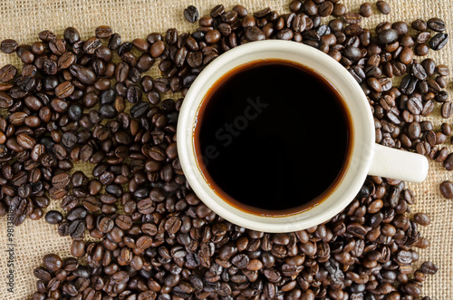 Hot americano and coffee beans