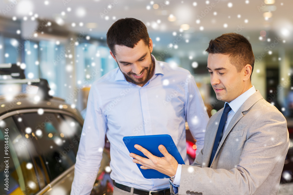 happy man with car dealer in auto show or salon happy man with car dealer in auto show or salon