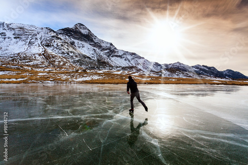 skating on frozen lake 