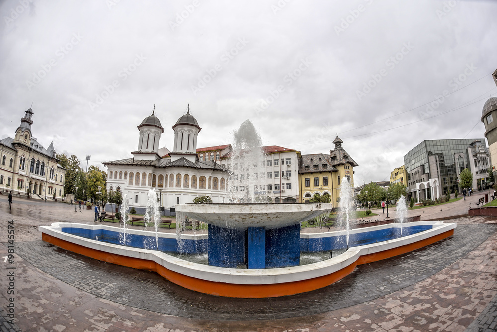 TARGU-JIU, ROMANIA-OCTOBER 08: Fountain in the downtown area  on October 08, 2014 in Targu-Jiu. Fisheye view.