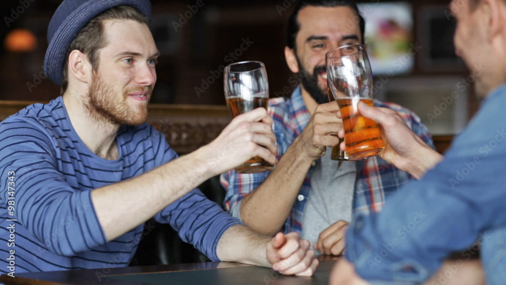 happy male friends drinking beer at bar or pub happy male friends drinking beer at bar or pub