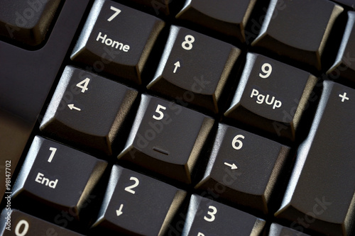 macro of a numeric pad with black keys