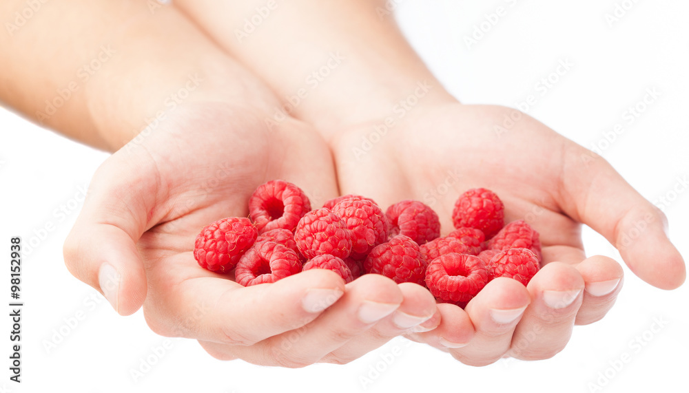 pile of raspberries isolated on a white background pile of raspberries isolated on a white background