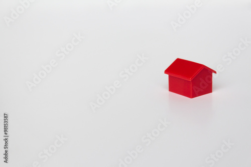 Obraz na plátne red  house miniature - toy house on white background