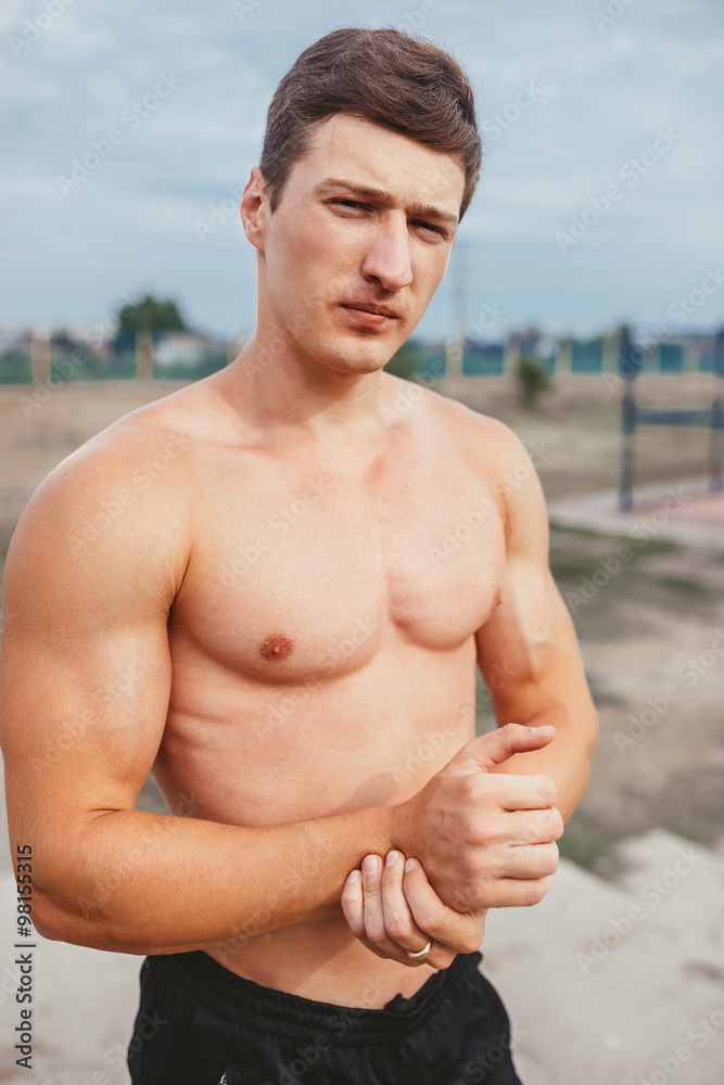 Fototapeta premium Man showing sports figure