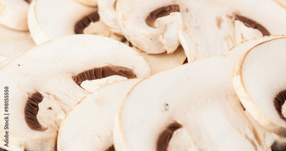 sliced mushrooms on a white background sliced mushrooms on a white background