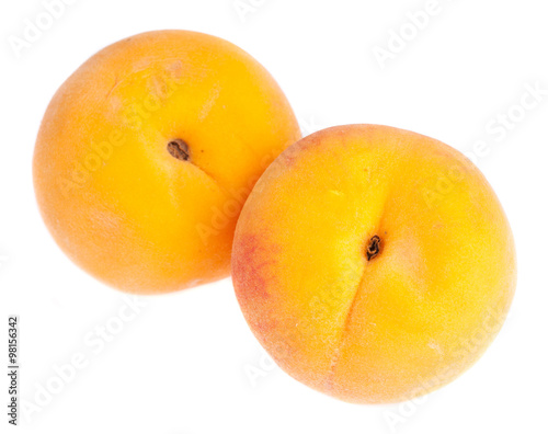 pair of peaches on a white background