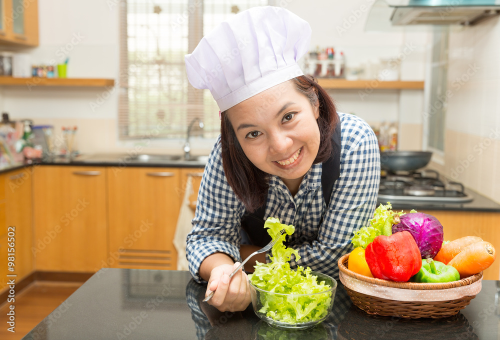 Female cook prepare vegetable to make salad Female cook prepare vegetable to make salad