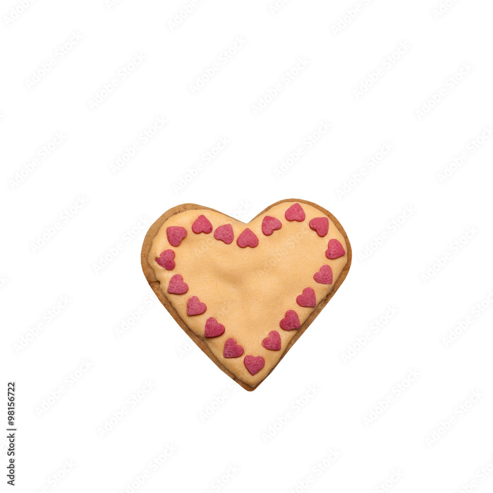 Homemade gingerbread cookie with colored frosting isolated on a Homemade gingerbread cookie with colored frosting isolated on a