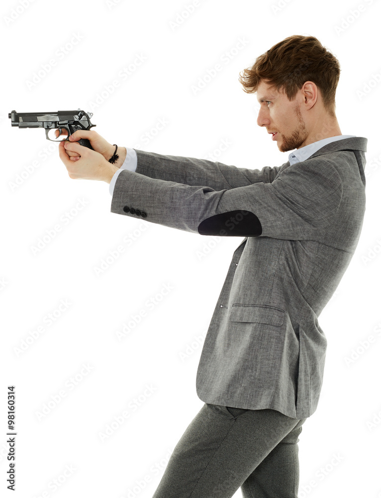 Young man using handgun Young man using handgun