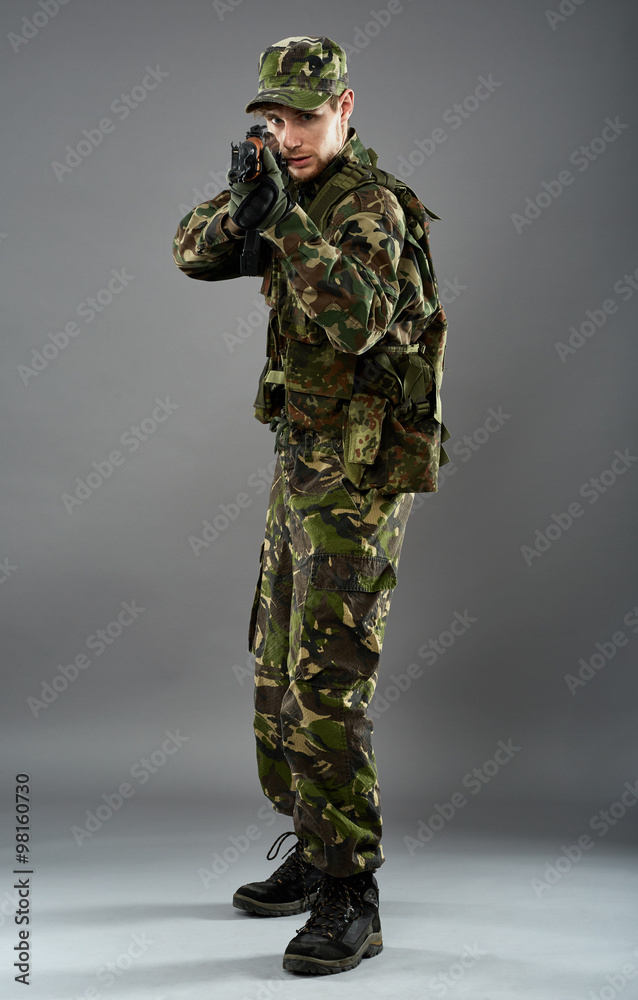 Soldier in uniform with machine gun Soldier in uniform with machine gun
