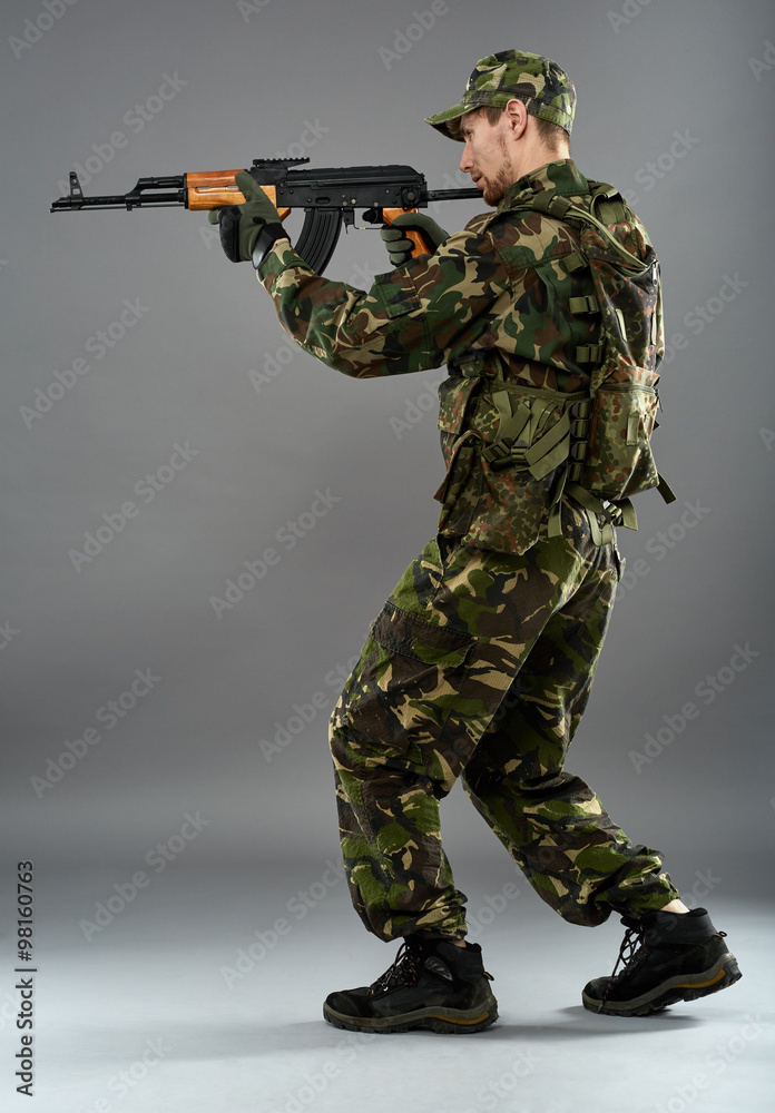 Soldier in uniform with machine gun Soldier in uniform with machine gun