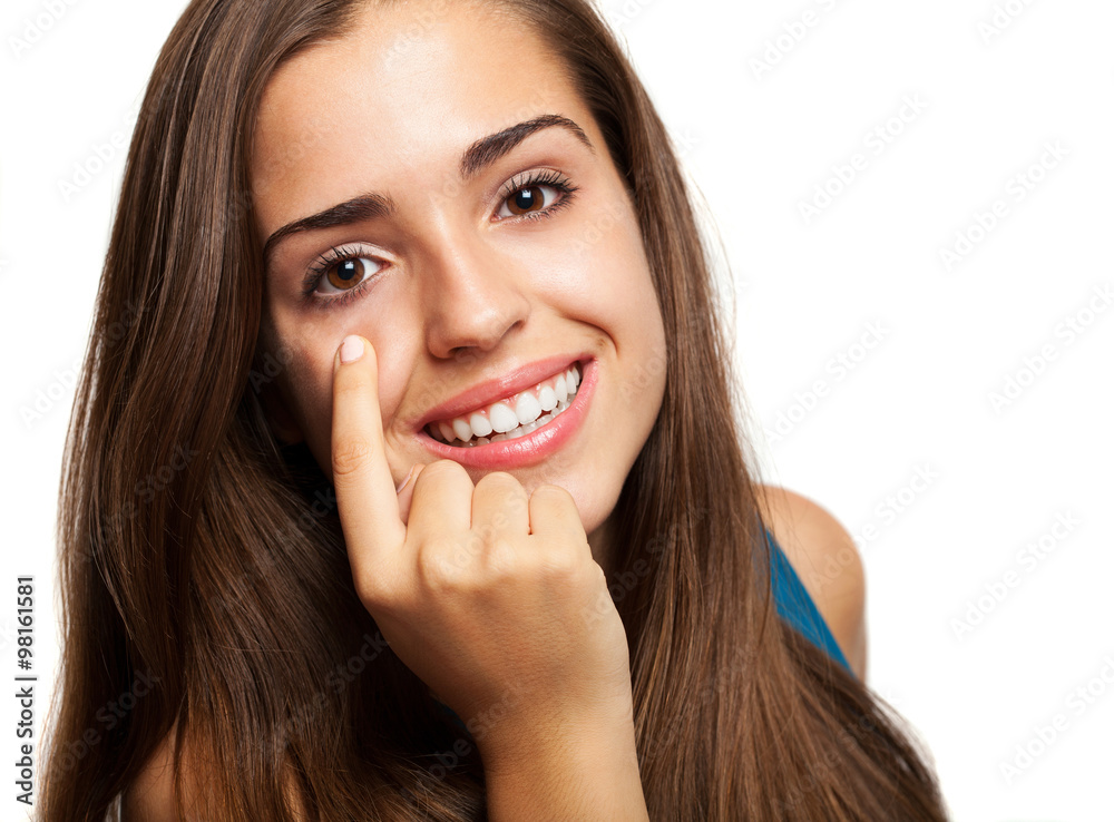 young woman pointing her eye on white background young woman pointing her eye on white background