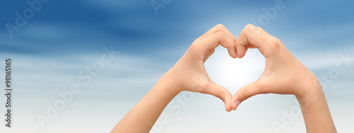 Conceptual heart made of hands banner