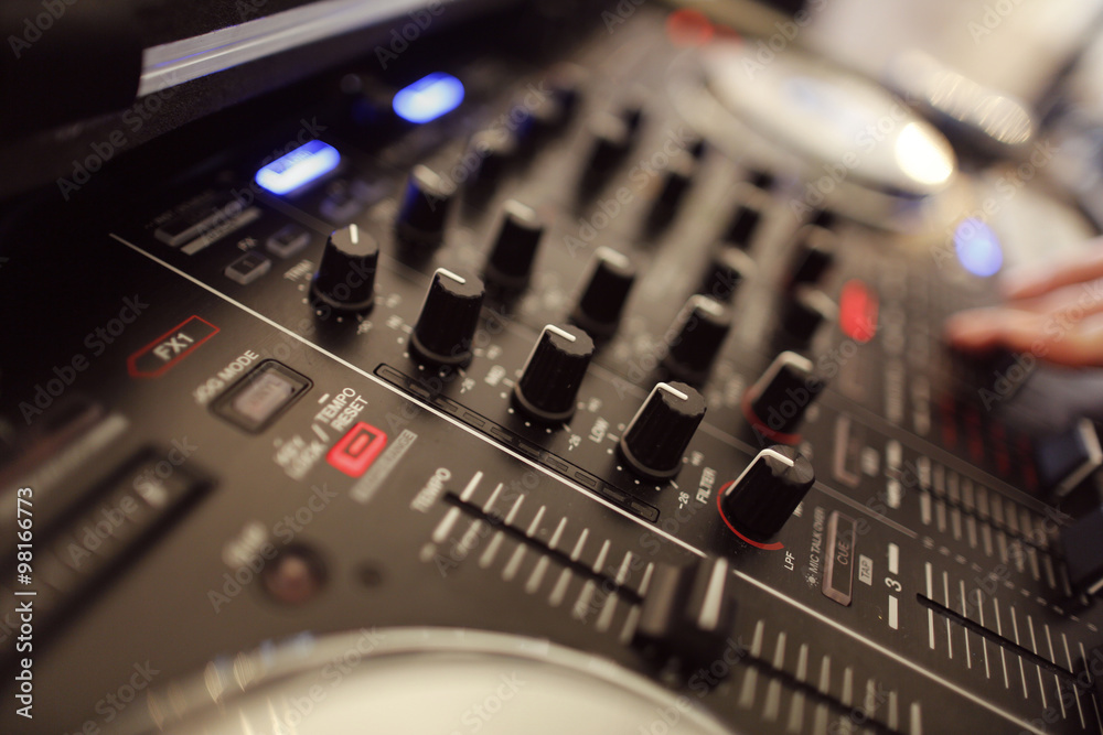 Closeup with DJ equipment with mixer nobs Closeup with DJ equipment with mixer nobs
