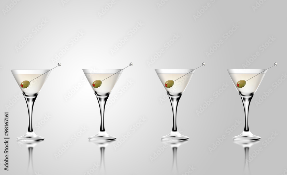Martini cocMartini cocktail glass with olives. Martini cocMartini cocktail glass with olives.