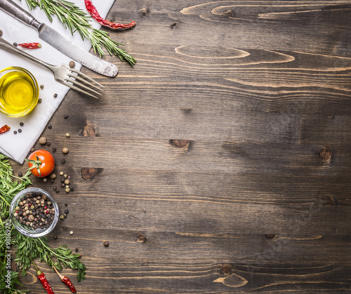 ingredients for cooking vegetarian food  tomatoes  butter  herbs  colorful peppers on wooden rustic background top view border  place for text 