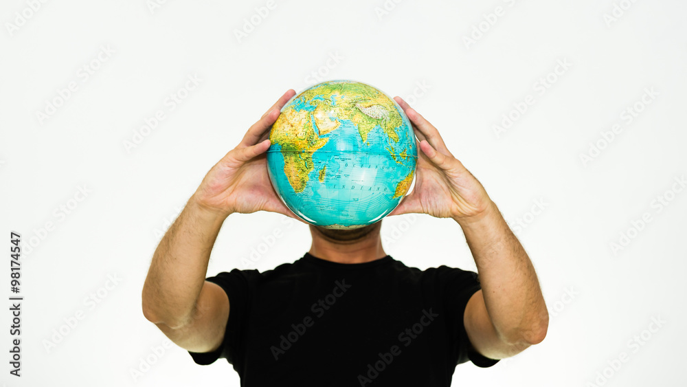 close-up of smiling caucasian man holding a world globe in front of his head - conceptual image isolated on white background with copyspace close-up of smiling caucasian man holding a world globe in front of his head - conceptual image isolated on white background with copyspace