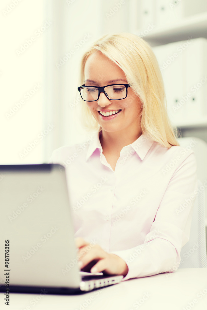 smiling businesswoman or student with laptop smiling businesswoman or student with laptop