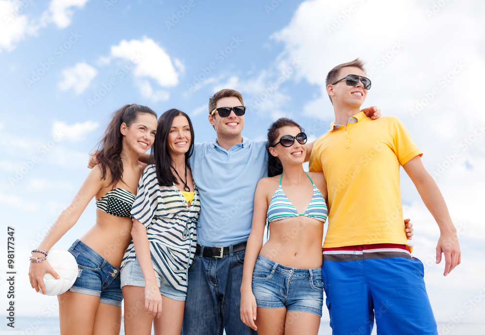 group of happy friends with beach ball group of happy friends with beach ball