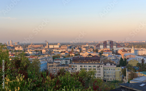 Panoramic view of Kiev lit by the rays of the setting sun. Ukrai © DmyTo