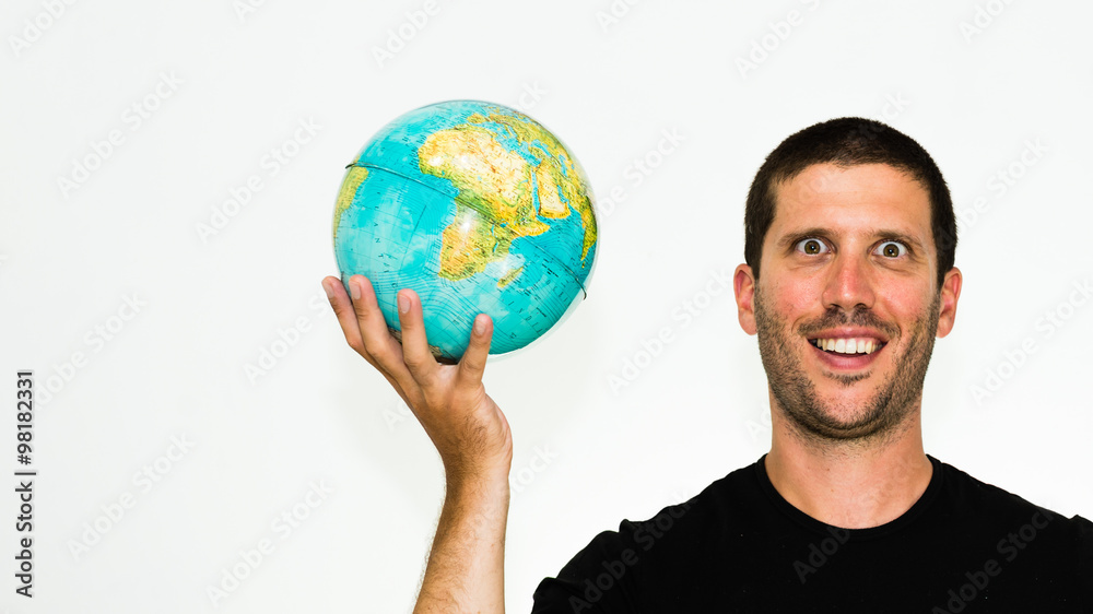 close-up of smiling caucasian man holding a world globe in his hand - conceptual image isolated on white background with copyspace close-up of smiling caucasian man holding a world globe in his hand - conceptual image isolated on white background with copyspace