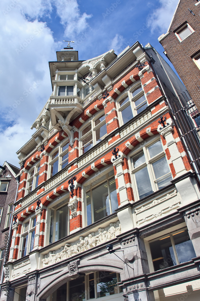 Ancient brick mansion with step gable, Amsterdam, Netherlands