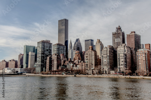 Manhattan skyline  skyscrapers as seen from Roosevelt Island in the East River  New York  NY