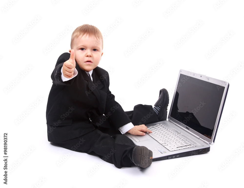 young boy with laptop showing thumbs up at camera isolated on white background young boy with laptop showing thumbs up at camera isolated on white background