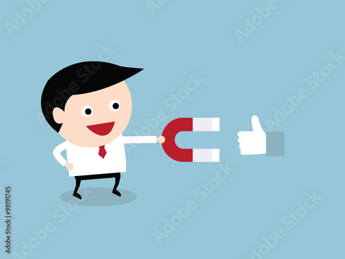 Businessman hold magnet attracting like. happy business concept.