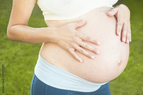 Wallpaper Mural Pregnant woman belly Torontodigital.ca